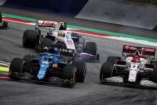 Fernando Alonso (ESP) Alpine F1 Team A521 and Kimi Raikkonen (FIN) Alfa Romeo Racing C41 battle for position.