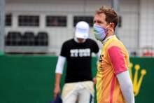 Sebastian Vettel (GER) Aston Martin F1 Team wearing a rainbow t-shirt on the grid.