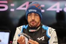 Fernando Alonso (ESP) Alpine F1 Team in the pits as the race is suspended.