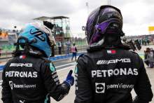 (L to R): Pole sitter Valtteri Bottas (FIN) Mercedes AMG F1 with team mate and fastest in qualifying Lewis Hamilton (GBR) Mercedes AMG F1 in parc ferme.