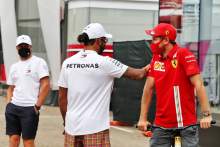 (L to R): Valtteri Bottas (FIN) Mercedes AMG F1; Lewis Hamilton (GBR) Mercedes AMG F1; and Sebastian Vettel (GER) Ferrari.