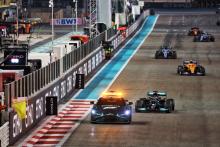 Lewis Hamilton (GBR) Mercedes AMG F1 W12 leads behind the Aston Martin FIA Safety Car.