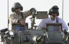 Awestruck Bright revs up Aussie troops in Iraq.