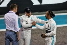 Lewis Hamilton (GBR) Mercedes AMG F1 in qualifying parc ferme with team mate Valtteri Bottas (FIN) Mercedes AMG F1 and Paul