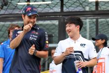 (L to R): Sergio Perez (MEX) Red Bull Racing and Yuki Tsunoda (JPN) AlphaTauri on the drivers