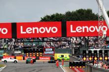 The scene at the start as the race is stopped. Formula 1 World Championship, Rd 10, British Grand Prix, Silverstone,