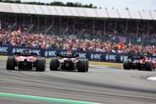 Max Verstappen (NLD) Red Bull Racing RB18 leads Carlos Sainz Jr (ESP) Ferrari F1-75. Formula 1 World Championship, Rd 10,