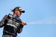 Lewis Hamilton (GBR) Mercedes AMG F1 celebrates his second position on the podium. Formula 1 World Championship, Rd 12,