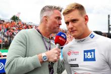(L to R): Ralf Schumacher (GER) Sky Sport Presenter with Mick Schumacher (GER) Haas F1 Team on the grid. Formula 1 World