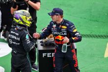 (L to R): Second placed Lewis Hamilton (GBR) Mercedes AMG F1 with race winner Max Verstappen (NLD) Red Bull Racing in parc