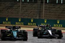 Fernando Alonso (ESP) Aston Martin F1 Team AMR23 and George Russell (GBR) Mercedes AMG F1 W14 battle for position. Formula