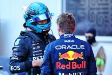 (L to R): George Russell (GBR) Mercedes AMG F1 and Max Verstappen (NLD) Red Bull Racing discuss the Sprint race in parc