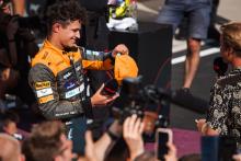 Lando Norris (GBR) McLaren with Nico Rosberg (GER) in parc ferme. Formula 1 World Championship, Rd 12, Hungarian Grand