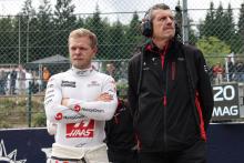 Toyota Gazoo Racing Kevin Magnussen (DEN) Haas F1 Team with Guenther Steiner (ITA) Haas F1 Team Prinicipal on the grid.

