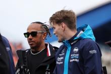 (L to R): Lewis Hamilton (GBR) Mercedes AMG F1 with Logan Sargeant (USA) Williams Racing on the drivers' parade. Formula 1