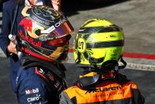 (L to R): Race winner Max Verstappen (NLD) Red Bull Racing in parc ferme with second placed Lando Norris (GBR) McLaren.
