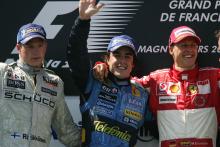 Race winner Fernando Alonso (ESP) Renault, Kimi Raikkonen (FIN) McLaren and Michael Schumacher (GER) Ferrari
French Grand