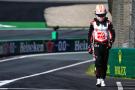 Nico Hulkenberg walks away after a crash at Turn 1