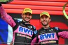 Esteban Ocon and Pierre Gasly celebrate on the podium