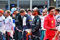 Lewis Hamilton (GBR) Mercedes AMG F1 and Max Verstappen (NLD) Red Bull Racing on the grid. Formula 1 World Championship,