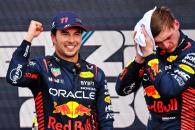 (L to R): Race winner Sergio Perez (MEX) Red Bull Racing celebrates on the podium with second placed team mate Max