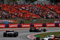 Sergio Perez (MEX) Red Bull Racing RB19 leads Yuki Tsunoda (JPN) AlphaTauri AT04. Formula 1 World Championship, Rd 8,