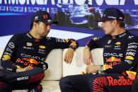 (L to R): Sergio Perez (MEX) Red Bull Racing and Max Verstappen (NLD) Red Bull Racing, in the post race FIA Press