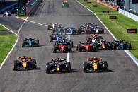 (L to R): Oscar Piastri (AUS) McLaren MCL60; Max Verstappen (NLD) Red Bull Racing RB19; and Lando Norris (GBR) McLaren MCL60