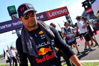 Sergio Perez (MEX) Red Bull Racing on the grid. Formula 1 World Championship, Rd 17, Japanese Grand Prix, Suzuka, Japan,
