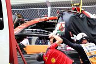 The Ferrari SF-23 of Carlos Sainz Jr (ESP) Ferrari is recovered back to the pits on the back of a truck, floor inspected by