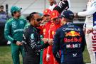 Lewis Hamilton (GBR) Mercedes AMG F1 with Sergio Perez (MEX) Red Bull Racing and Max Verstappen (NLD) Red Bull Racing.