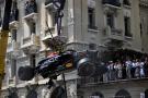 The Red Bull Racing RB20 of Sergio Perez (MEX) Red Bull Racing is craned from the circuit after the race stopping start