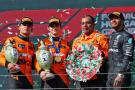 The podium (L to R): Lando Norris (GBR) McLaren, second; Oscar Piastri (AUS) McLaren, race winner; Randy Singh (GBR) McLaren