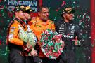 The podium (L to R): Lando Norris (GBR) McLaren, second; Oscar Piastri (AUS) McLaren, race winner; Randy Singh (GBR) McLaren