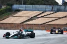 Lewis Hamilton (GBR) Mercedes AMG F1 W13 leads Sergio Perez (MEX) Red Bull Racing RB18.